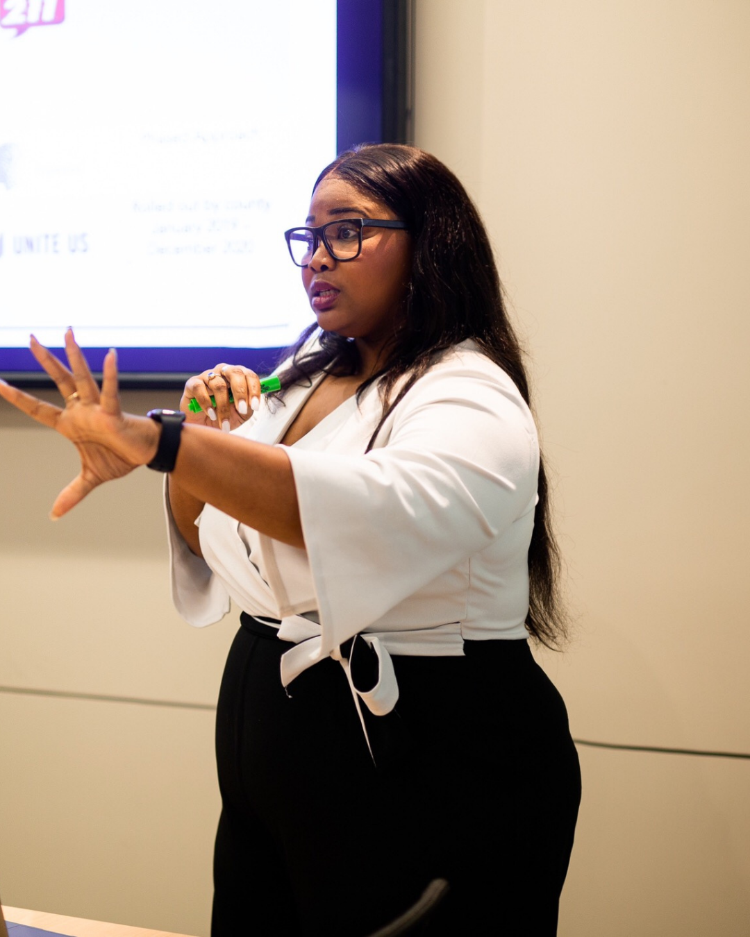 Georgina Dukes-Harris laughing during a panel conversation